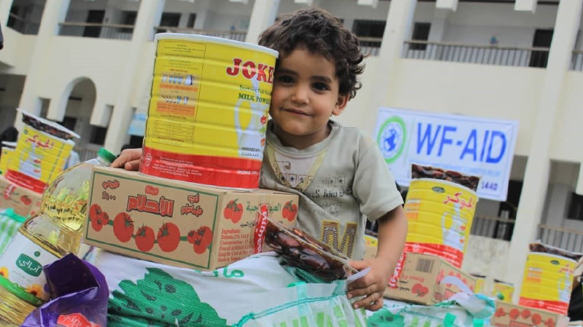 Yemen child smiling after received aid